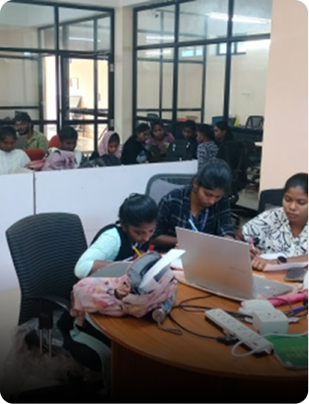 Students learning together at shared desks